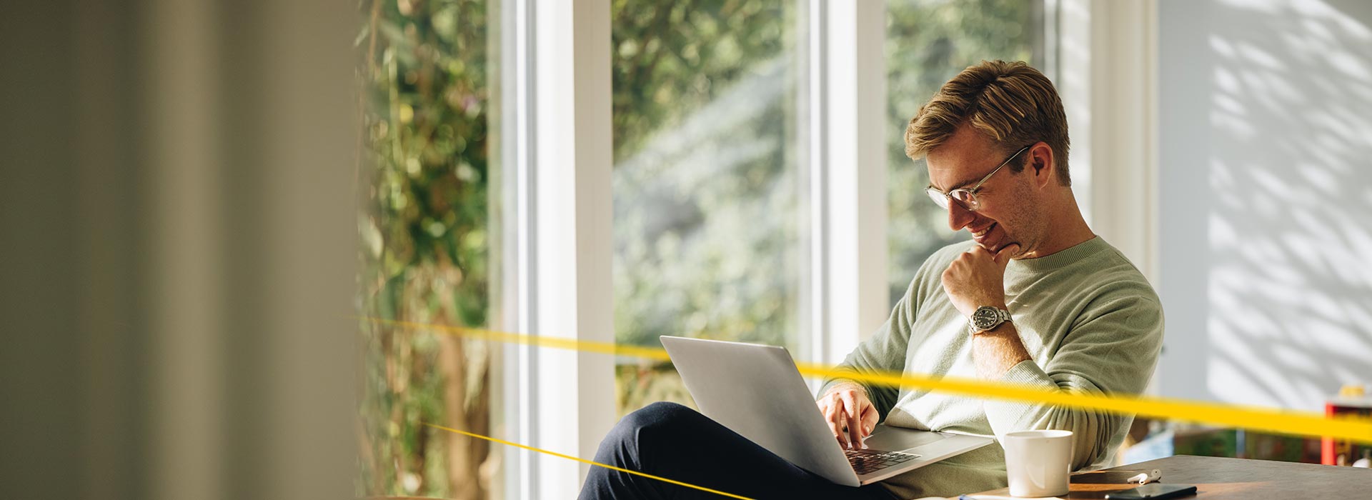 Person with recycled laptop | LGI brand reuseIT