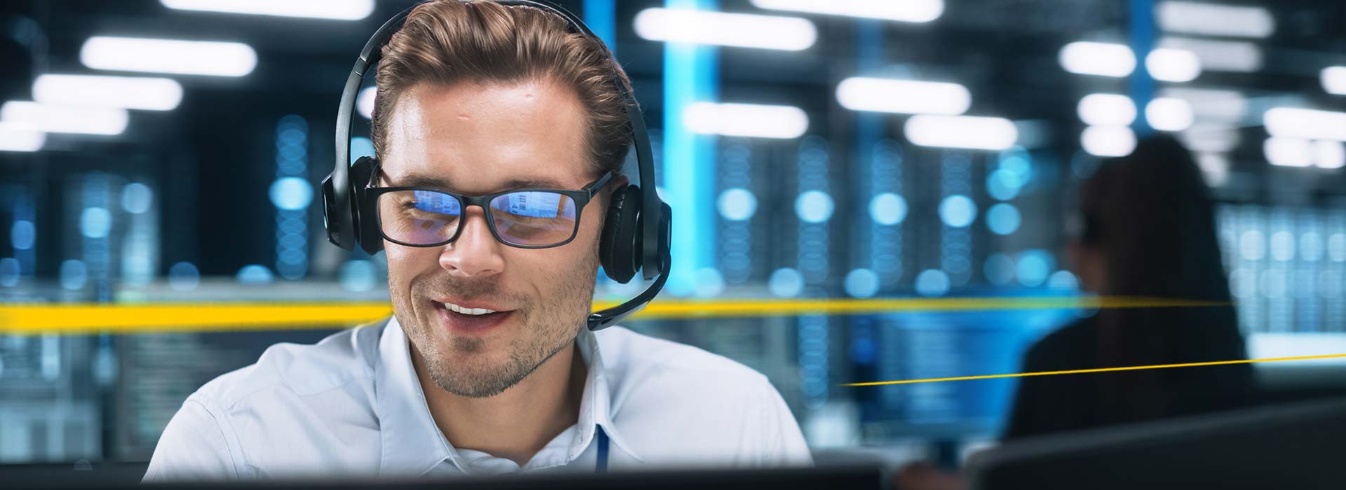 PTS employee sits at a desk | LGI